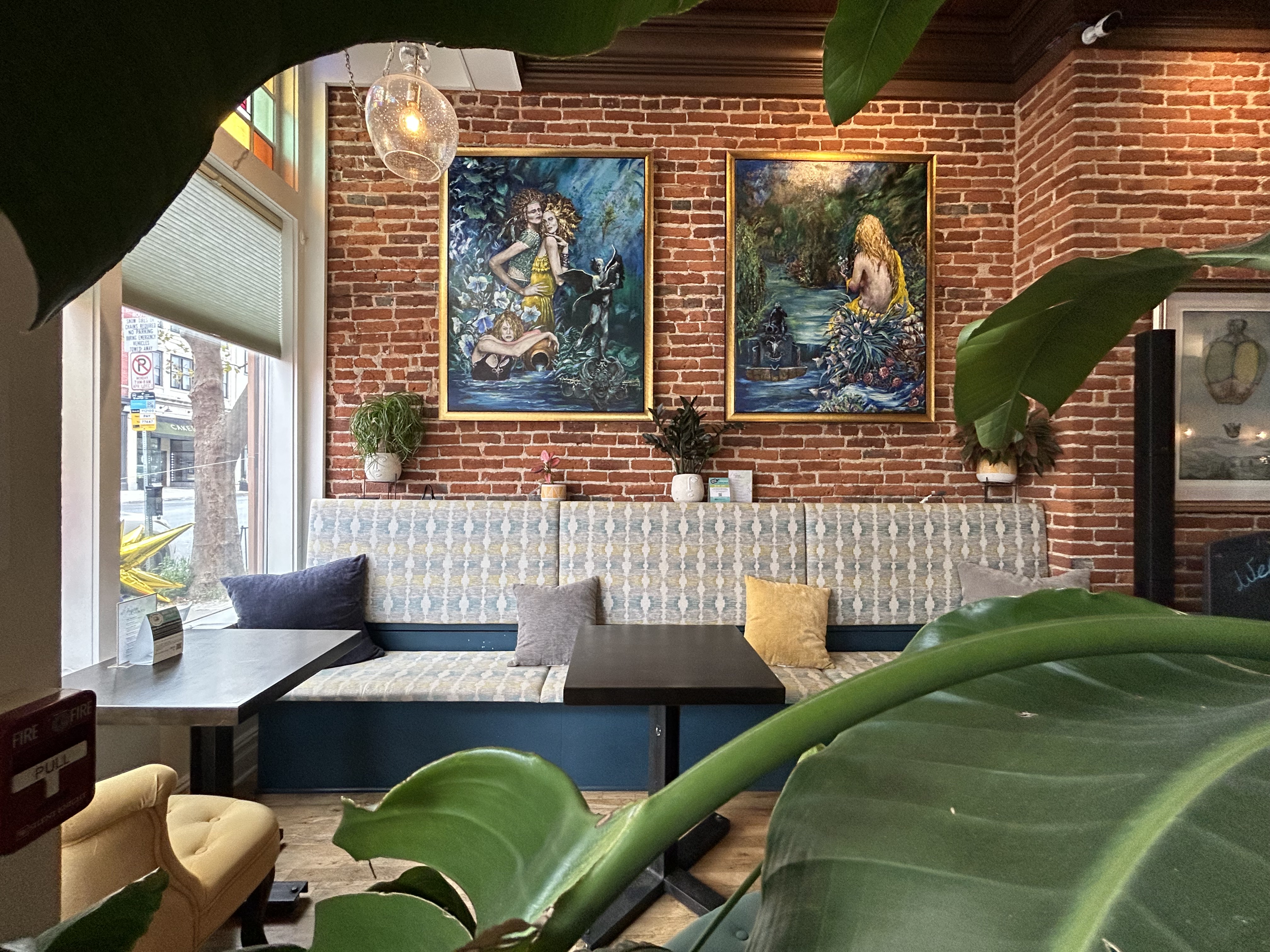 Tapestry Lounge interior with elegant chandelier and seating