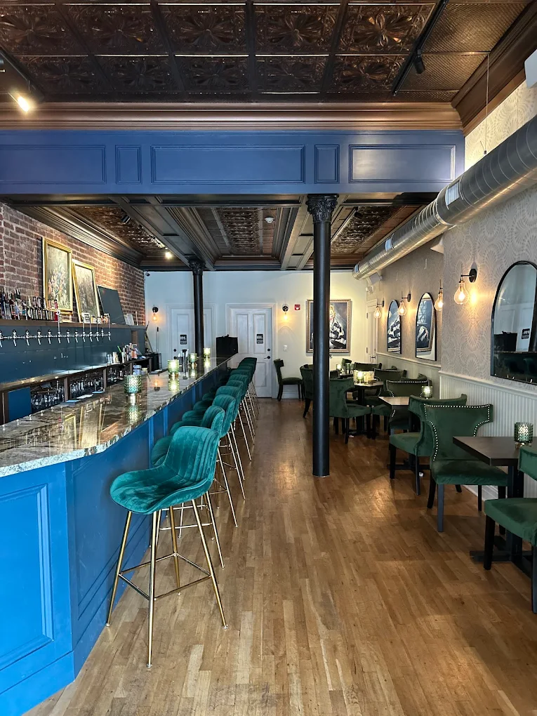 Full bar interior with exposed brick walls